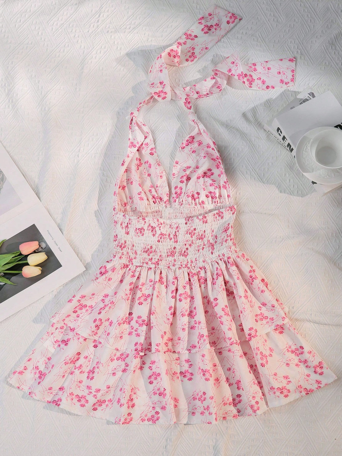 Get ready to turn heads this summer with our Floral Print Backless Halter Dress! With a vibrant floral pattern and a playful backless design, this dress is the perfect choice for all your summer events. Stay cool and stylish in this must-have piece for your wardrobe.