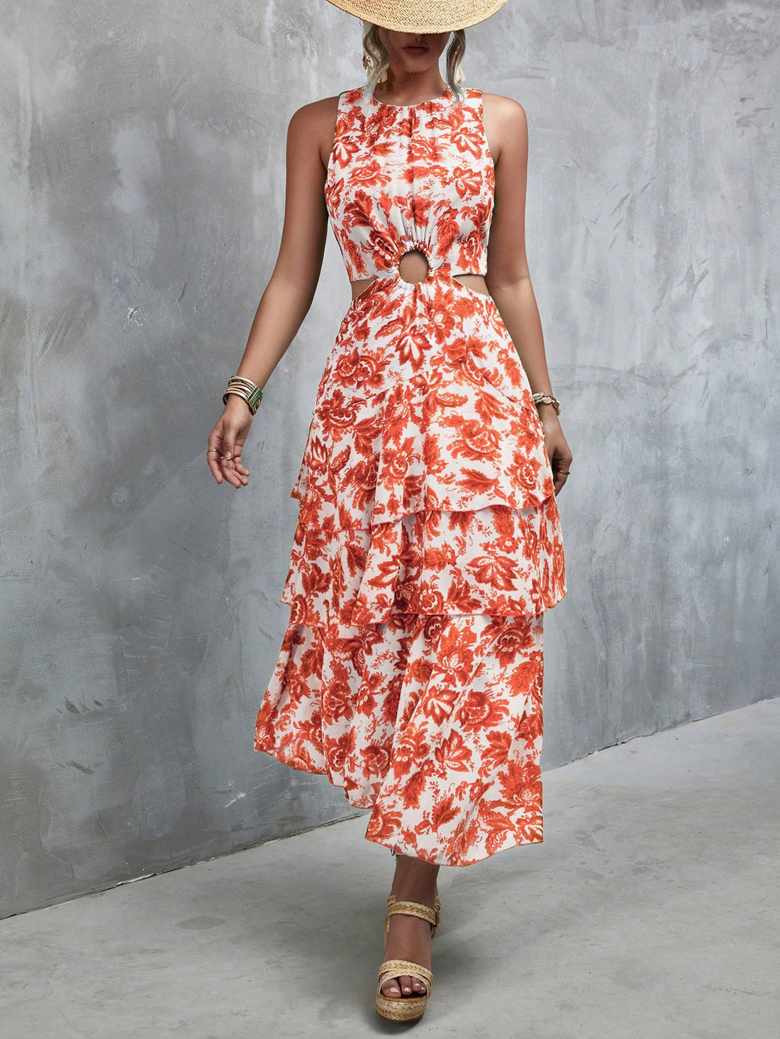 Get ready to turn heads with this Floral Print Chiffon Dress. Its unique Ring-Linked Cut-Out and Layered Hem add an edge to this vacation outfit for women. Soft and flowy chiffon, paired with a playful floral print, make this dress perfect for a day at the beach or a night out on the town.