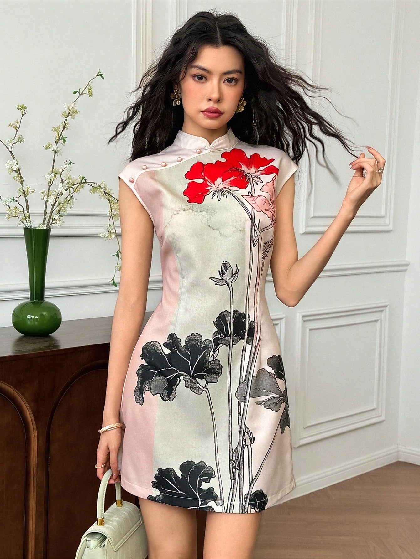 Step into charm and grace with this Floral Print Chinese Style Mini Dress. Featuring flutter sleeves and a classic cheongsam collar, it blends traditional elegance with a flirty, playful vibe. The vibrant floral pattern adds a fresh pop of color, making it perfect for sunny days or festive nights. Its mini length keeps things light and fun, letting you twirl with ease wherever you go.