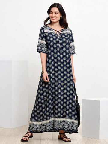 Get ready to bloom in this effortlessly stylish floral print dress! Featuring a playful tie neck and elegant allover design, this dress will keep you looking chic and on-trend. Perfect for any occasion, this dress will make you feel confident and fashionable.