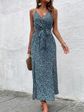 Get ready to turn heads with our Floral Print Maxi Dress! Perfect for your next vacation, this dress features a playful slit hem and a stunning floral print. Embrace your inner fashionista and stand out in this must-have cami outfit for women. (P.S. It's also comfy enough to dance in all night long!)