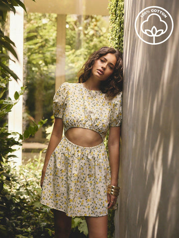 Step into sunshine and smiles with this Floral Puff Sleeve Cutout Cotton Mini Dress! Its playful puff sleeves and flirty cutout detail bring a fresh, breezy vibe perfect for summer vacations. Crafted from soft cotton, it keeps you cool and comfy while turning heads wherever you go. Effortless style meets cheerful charm in this mini dress made for sunny days and fun adventures.