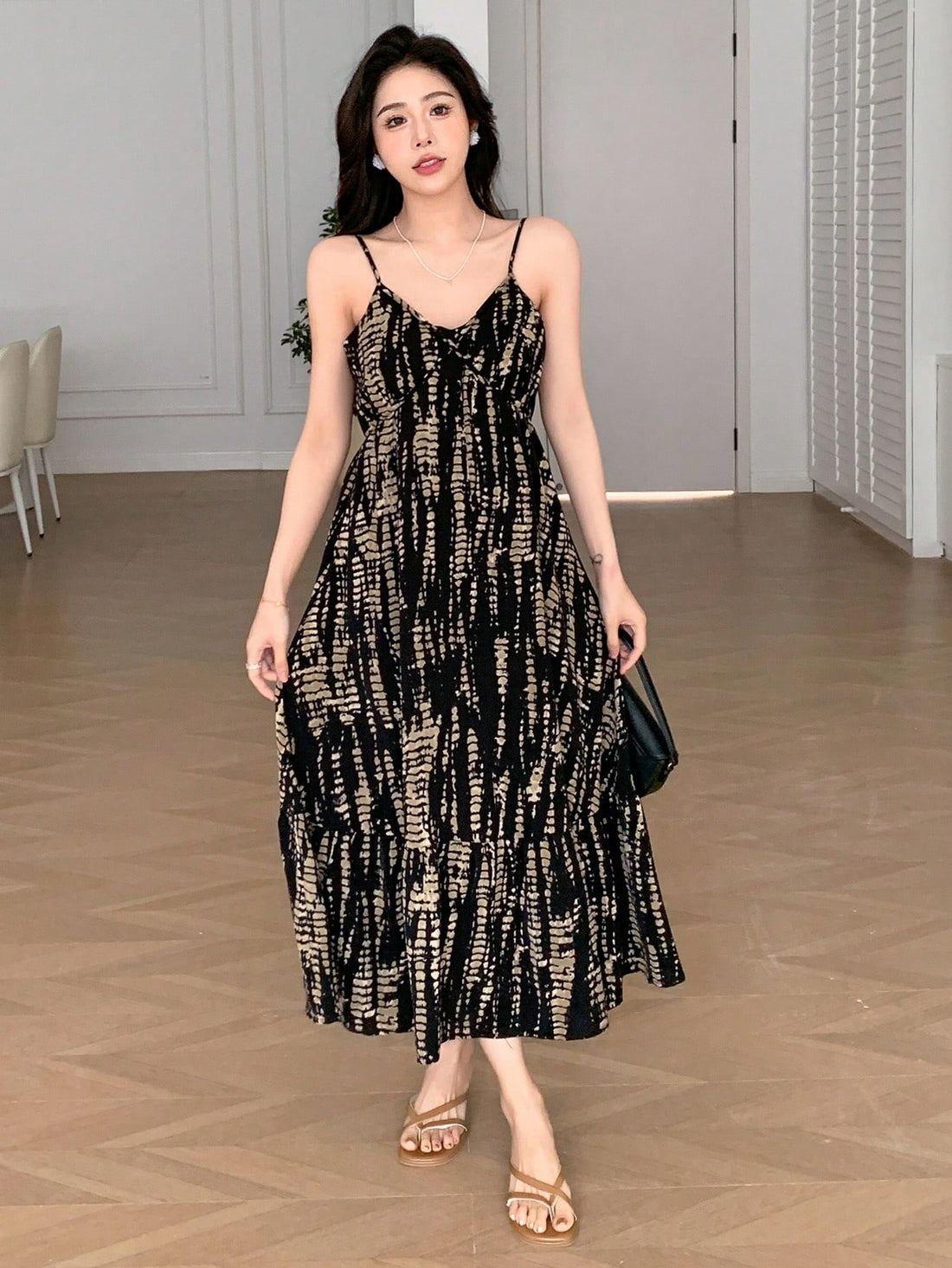 Get ready to bloom this summer with our Floral Ruffle Hem Spaghetti Strap Dress! This chic essential will have you looking stylish and feeling comfortable all season long. With its playful ruffle hem and flattering spaghetti straps, this dress is the perfect addition to your summer wardrobe. (Flower power never looked so good!)