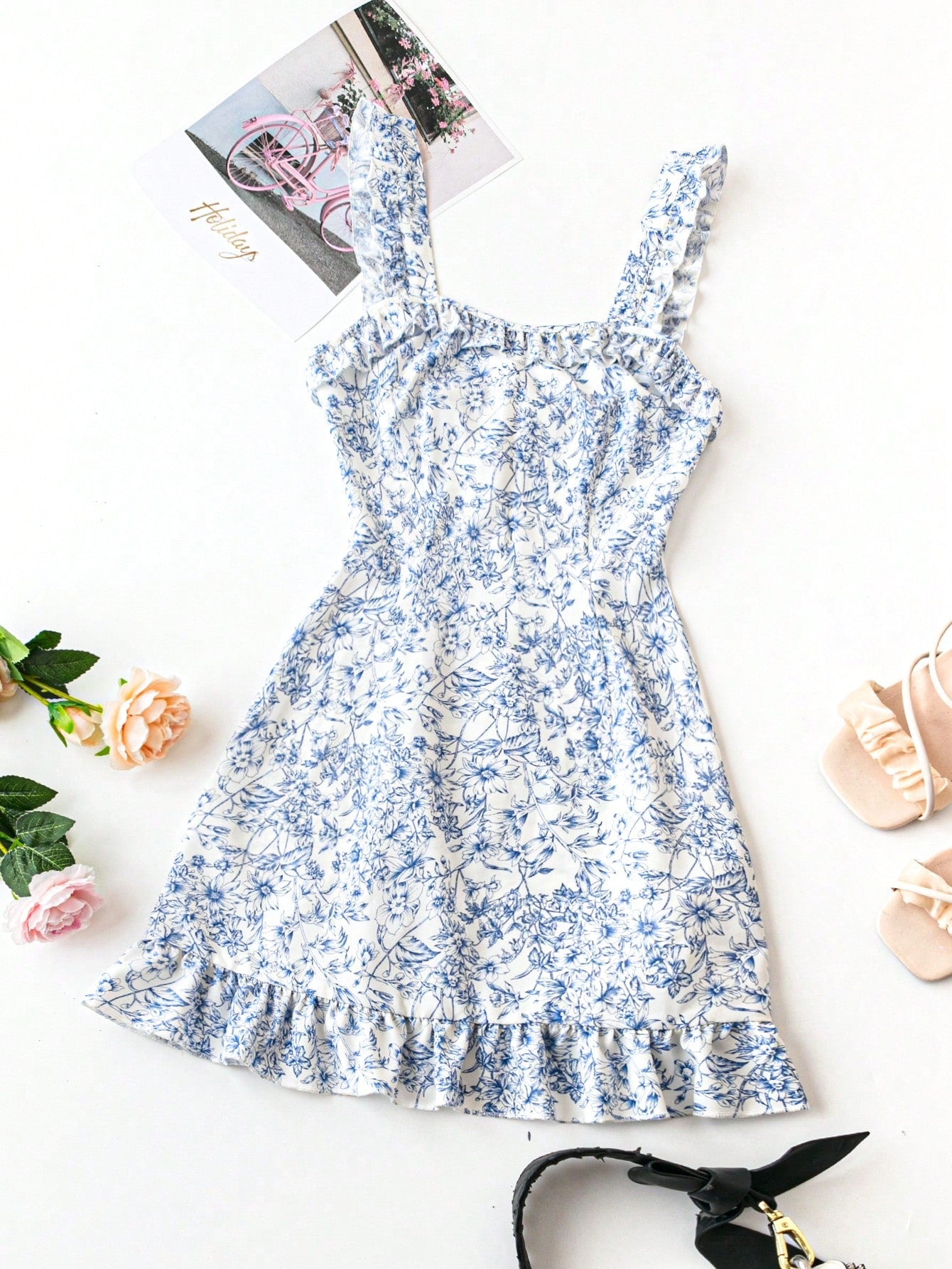 Flaunt your fashion-forward style this spring with our Floral Ruffle Hem Spaghetti Strap Dress! With its playful ruffle hem and delicate floral pattern, this dress is the perfect addition to any spring wardrobe. Say hello to effortless elegance and hello to spring! (Hint: pairs perfectly with a sun hat and some oversized sunglasses.)