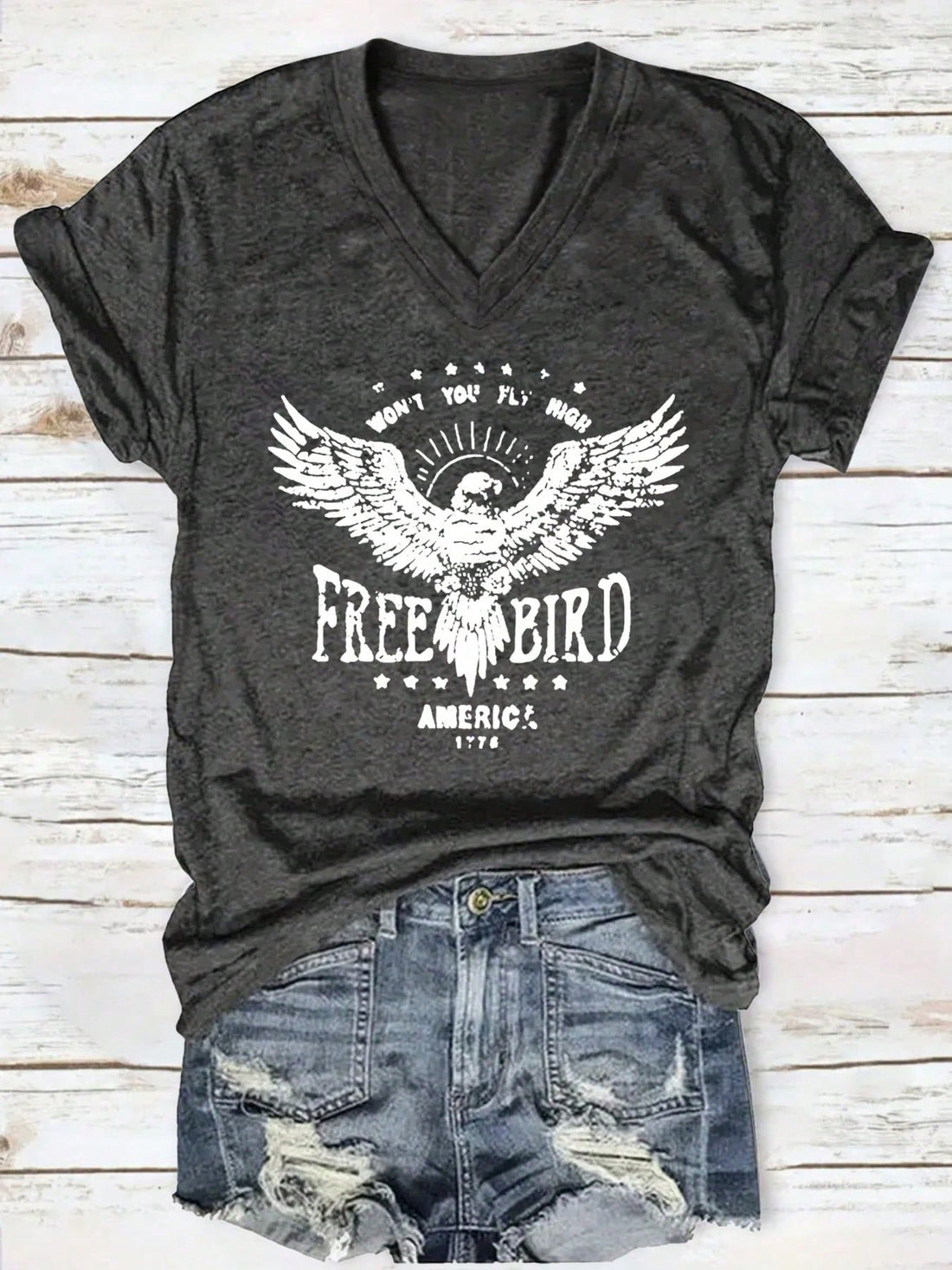 This Floral V-Neck Printed Tee is perfect for adding a touch of spring and summer to your casual style. With a flattering v-neck and fun floral print, this tee will be your go-to for any laid-back look. Enjoy the warmer weather with this playful and stylish tee!