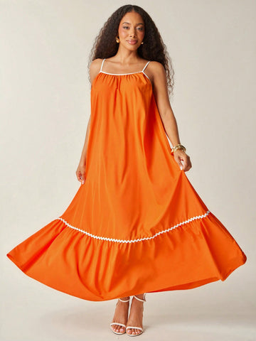 Embrace sunny days in this flowy woven sun dress, designed with a playful ruffle hem and charming wavy trim. Lightweight and breezy, it’s your perfect companion for beach strolls or summer picnics, keeping you cool and effortlessly stylish all day long.