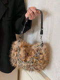 Add a dash of wild charm to your look with this Fluffy Leopard Spot Crossbody Bag. Perfect for autumn and winter, its soft, plush texture keeps your style cozy and fun while the eye-catching leopard print adds a playful edge. Compact yet roomy enough for your essentials, this crossbody is your go-to accessory for hands-free adventures with a touch of fierce fashion.