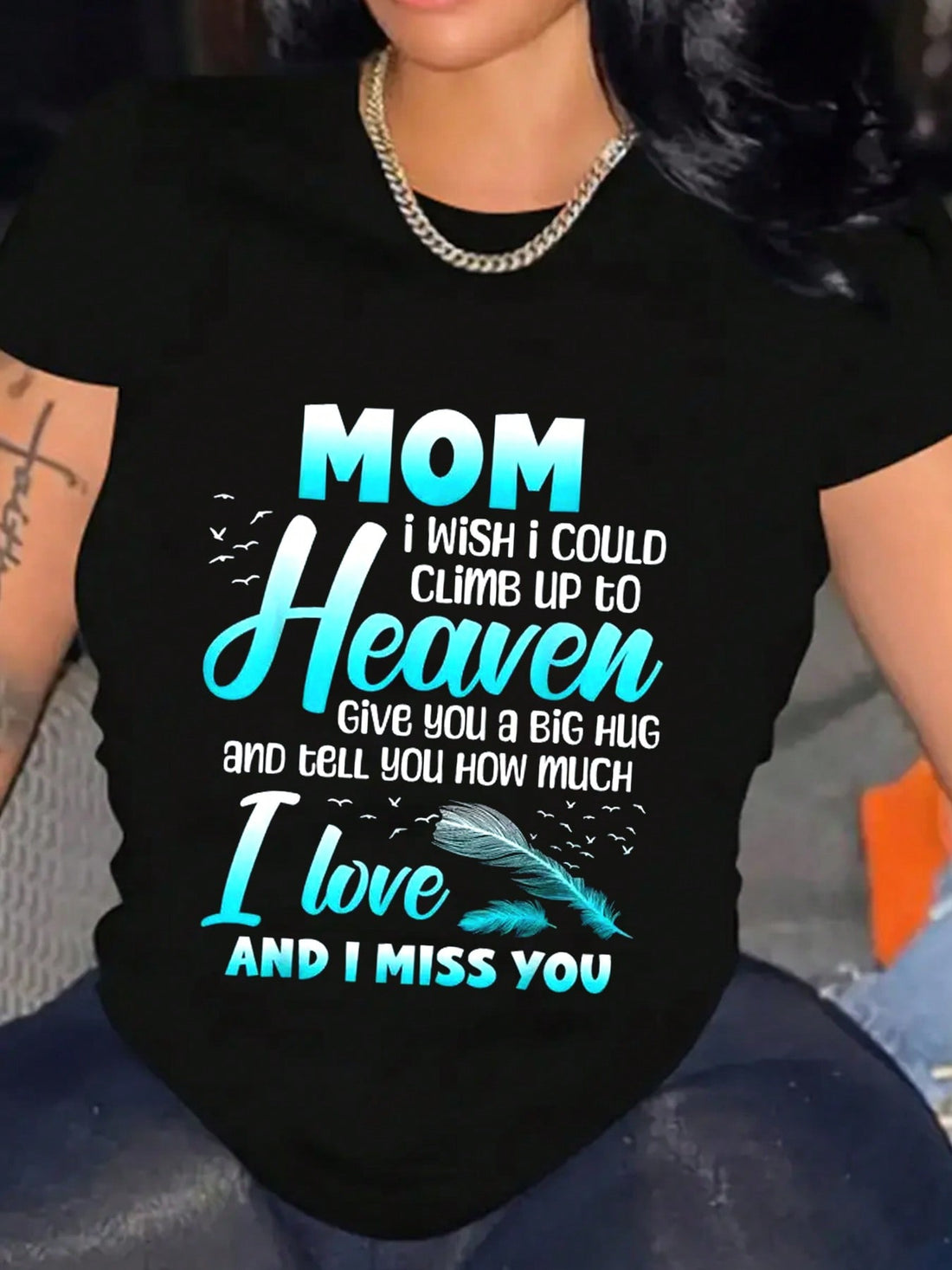 Keep your 'Mom, My Angel in Heaven' close to your heart with this playful graphic tee. Perfect for everyday wear, this quirky shirt is a loving tribute to your mother and a stylish addition to your wardrobe.