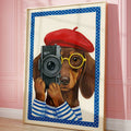 Framed dachshund photographer wall art leaning against pink wall