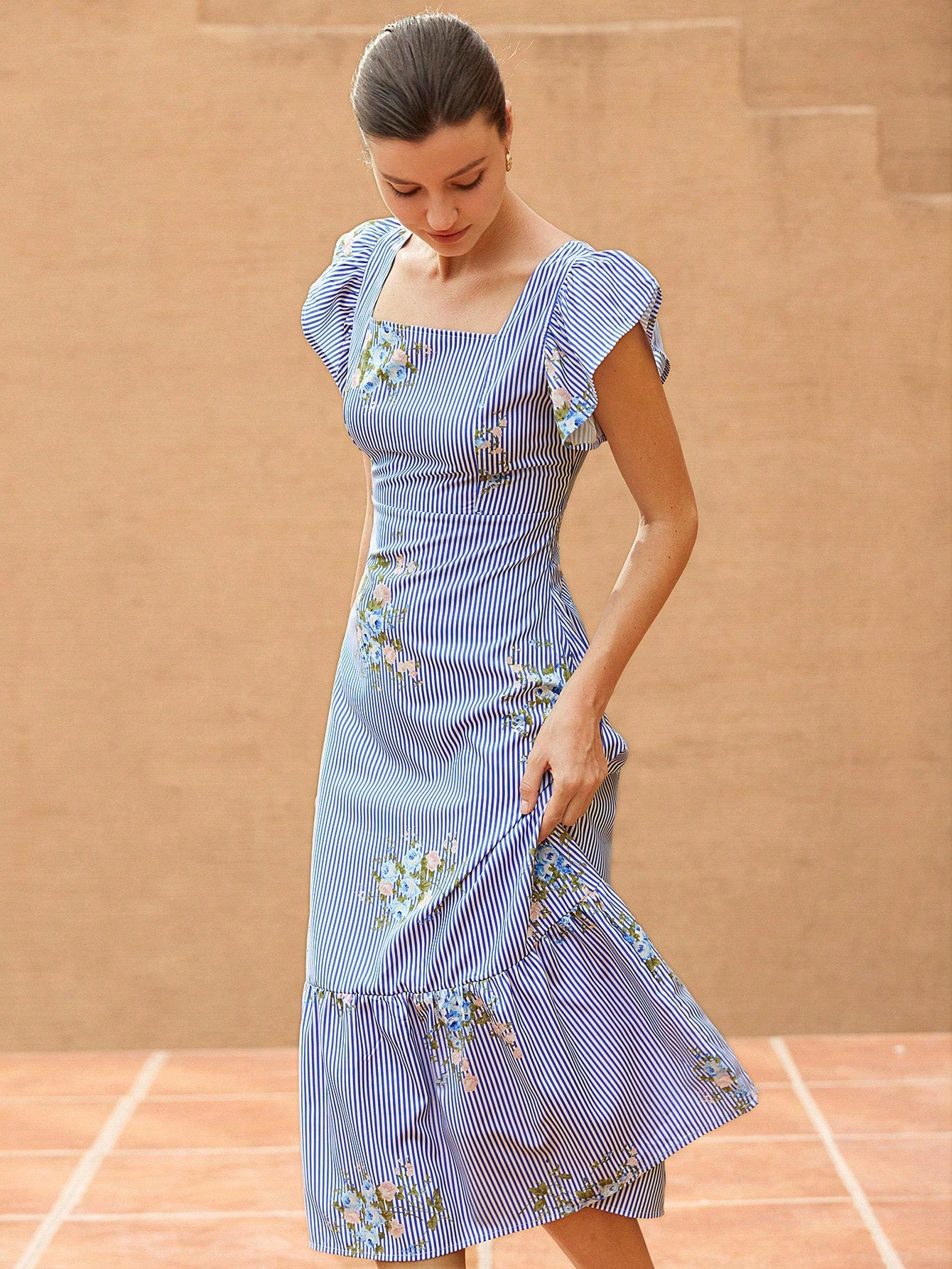 Feel effortlessly chic in our French Elegant Maxi Dress! The V-neck and sleeveless design adds a touch of elegance while the ruffle flounce and striped floral patchwork bring a playful twist. With a cinched waist to flatter your figure, this dress is perfect for any occasion.