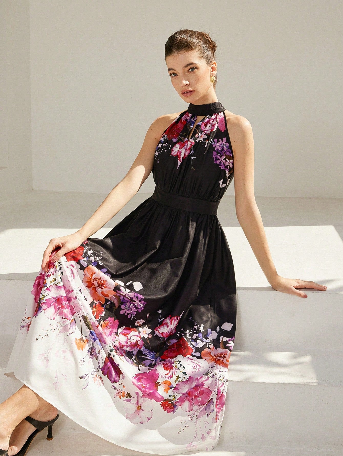 This A-line dress is as versatile as it is stylish - perfect for your next vacation! With a French-inspired floral print and halter neckline, it's sure to turn heads. Made for the playful and fun-loving fashionista who loves to stand out (in a good way, of course).