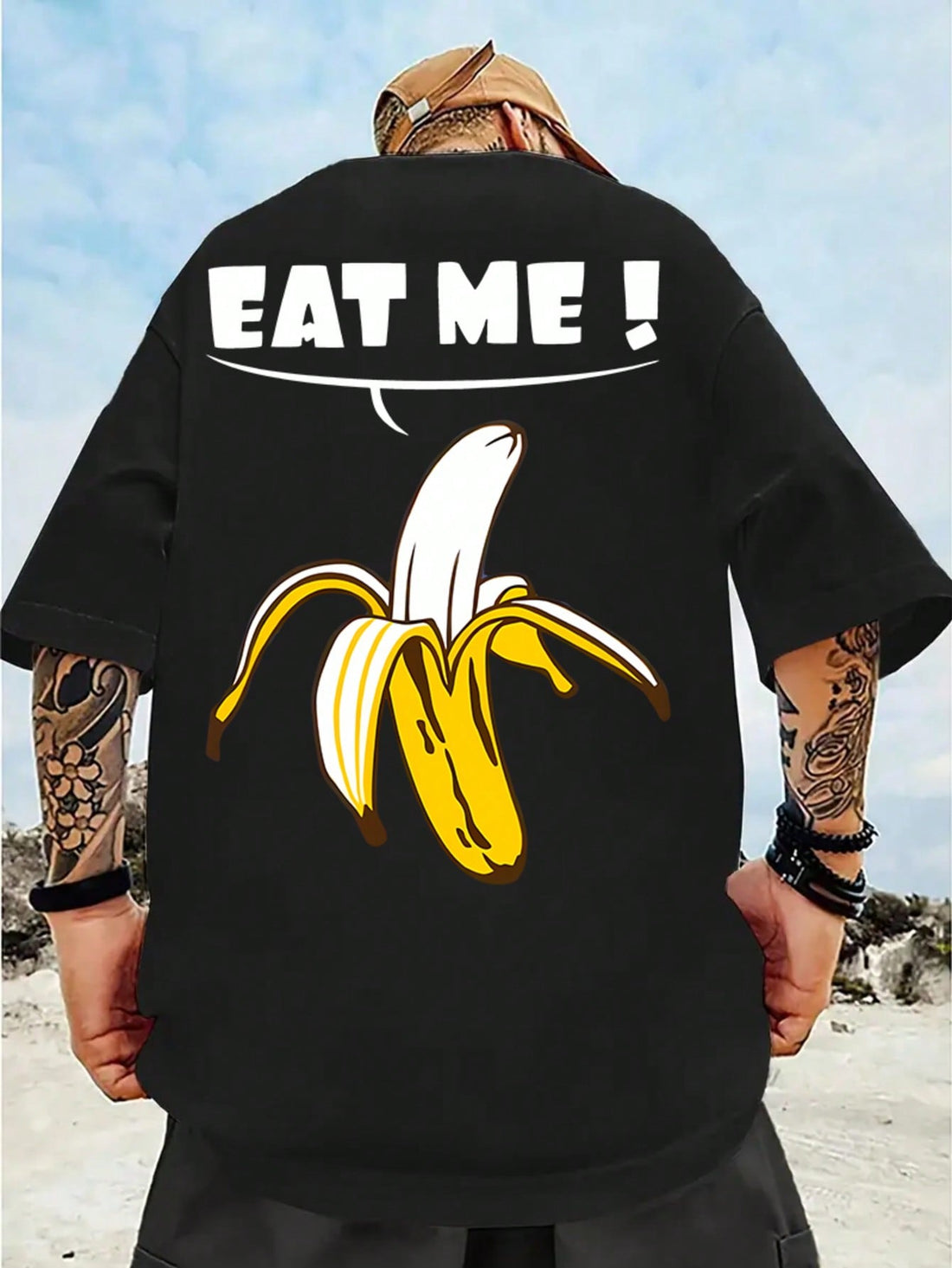Make a statement with our Big Banana Graphic T-Shirt! This eye-catching men's tee brings a splash of humor to your casual wardrobe. Soft, breathable fabric keeps you cool during spring and summer adventures, while the bold banana design turns heads wherever you go. Pair with jeans or shorts for an instantly fun, stylish look that's ripe for compliments!