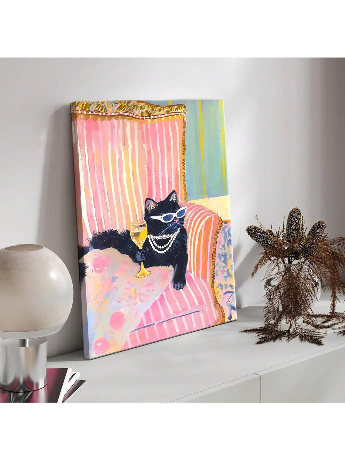 Add a splash of fun to your space with this Funky Black Cat Martini Canvas Art. Featuring a playful black cat against a vibrant pink background, this dopamine-boosting wall decor is perfect for eclectic bedrooms and dorm rooms. Its quirky design brings a lively, whimsical vibe that brightens any room and sparks joy every time you look at it.