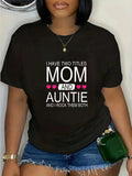 Get ready for double the laughs with this Funny Dual Title Tee! Featuring the playful words 'Mom & Auntie' on a comfortable short sleeve t-shirt, this tee is perfect for moms and aunties with a good sense of humor. Add some fun to your wardrobe and spread the joy to others!