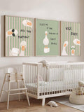 Three framed funny goose bathroom canvas prints with pink and green stripes above a nursery crib