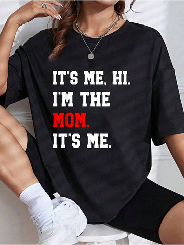 This humorous t-shirt is perfect for moms with its playful phrase, "It's Me, Hi, I'm The Mom". A great gift for any mother, this shirt adds a touch of fun to any outfit. Show off your humor and embrace your mom status with this quirky tee.