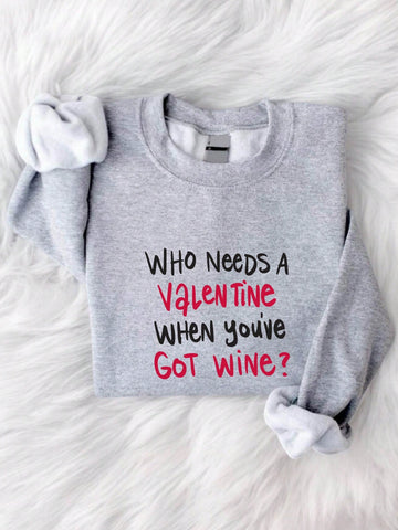 Who needs a Valentine when you've got wine? This hilarious sweatshirt for women features a funny slogan that guarantees to bring a smile to your face. Whether you're celebrating solo or with your friends, this sweatshirt will keep you cozy and stylish while also making a statement. Cheers to that!