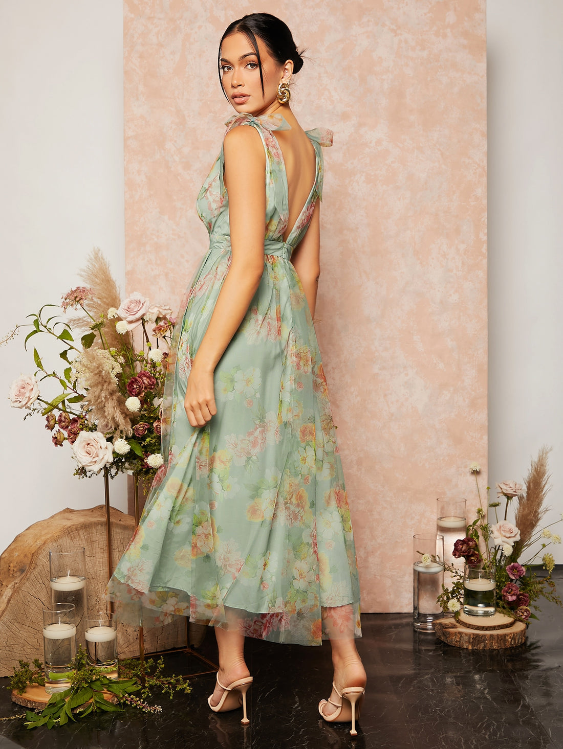 Add a touch of elegance to your next garden party with our Garden Party Perfection Dress. The beautiful floral print and delicate tie shoulder detail make this mesh dress a must-have. Perfect for any occasion, bring out your inner fashionista with this stunning piece.