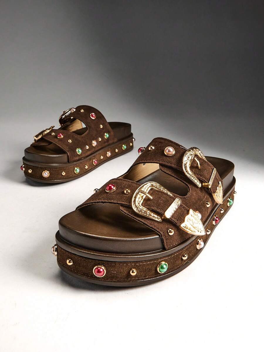 Front three-quarter view of coffee-brown gem-studded platform slide sandals