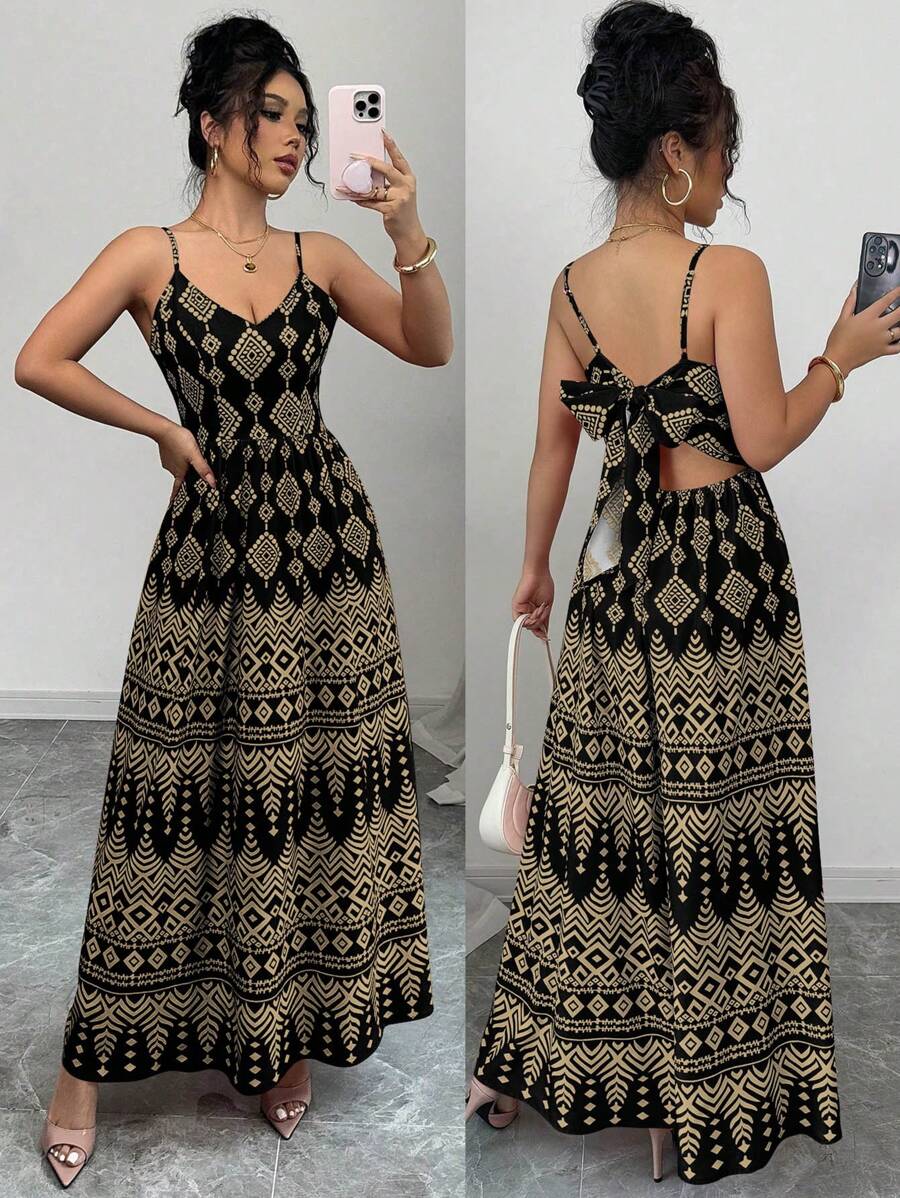 Turn heads wherever you go with this Geometric Print Backless Strap Dress. Its playful, vibrant pattern pairs perfectly with the breezy, backless design to keep you cool and stylish on vacation or at any event. Whether you're strolling the boardwalk or dancing under the stars, this dress adds a fun, elegant flair to your wardrobe. Embrace effortless charm and let your summer style shine!