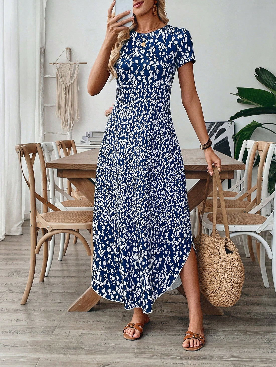 Upgrade your beach style with this geometric print A-line dress! Designed for comfort and style, it's perfect for your next vacation. Made with a soft and lightweight knit fabric, this dress boasts a flattering round neck and short sleeves. Get ready for some fun in the sun!