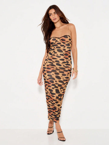 Turn heads in this Glam Leopard Print Ruched Bodycon Midi Dress, designed to hug your curves and elevate your nights out. The eye-catching leopard print adds a wild edge, while the ruched detailing flatters every silhouette. Perfect for cozy fall and winter evenings, this dress pairs effortlessly with your favorite boots or heels for a playful yet fierce look. Embrace your bold side and make every outing unforgettable.