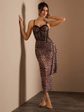 Turn heads in this stunning Glamine maxi dress that perfectly blends wild and refined. The leopard print commands attention while the asymmetric waist creates an effortlessly chic silhouette that flatters every figure. Delicate lace accents and strategic fish bone detailing add sophistication and structure, ensuring you look polished from day to night. Whether you're heading to a special event or elevating your everyday style, this dress is your go-to for making a bold, elegant statement.