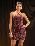 Turn heads this season in the Glamine Vintage Halter Backless Sequin Mini Dress—where retro glamour meets modern edge. This show-stopping piece features a flattering halter neckline and daring backless design that lets you shine from every angle. Shimmering sequins catch the light with every move, making it the perfect choice for autumn parties, nights out, or any occasion calling for a little extra sparkle. Slip it on and get ready for compliments!