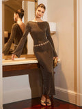 Step into the spotlight with this Glamorous Gold Draped Backless Maxi Dress, perfect for turning heads at your favorite winter and fall celebrations. The luxurious gold fabric catches the light beautifully, while the backless design adds a daring touch of elegance. Its flowing drapes create a silhouette that dances with every step, making you feel effortlessly radiant and ready to own the party.