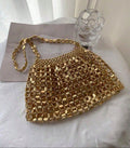 Add a splash of sparkle to your night with this Glamorous Gold Sequin Evening Bag. Perfectly sized to hold your essentials, it dazzles at parties, weddings, and prom, making you the center of attention. Its shimmering gold sequins catch the light beautifully, adding a playful touch of luxury to any outfit. Get ready to shine and make every moment unforgettable!
