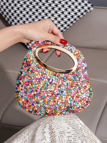 Add a splash of sparkle to your night with this Glamorous Mini Evening Bag. Its colorful rhinestone patchwork catches every eye, while the asymmetrical dual handles give it a quirky twist. Perfectly sized for your party essentials and makeup must-haves, this clutch lets you shine wherever you go—because glam is always in!