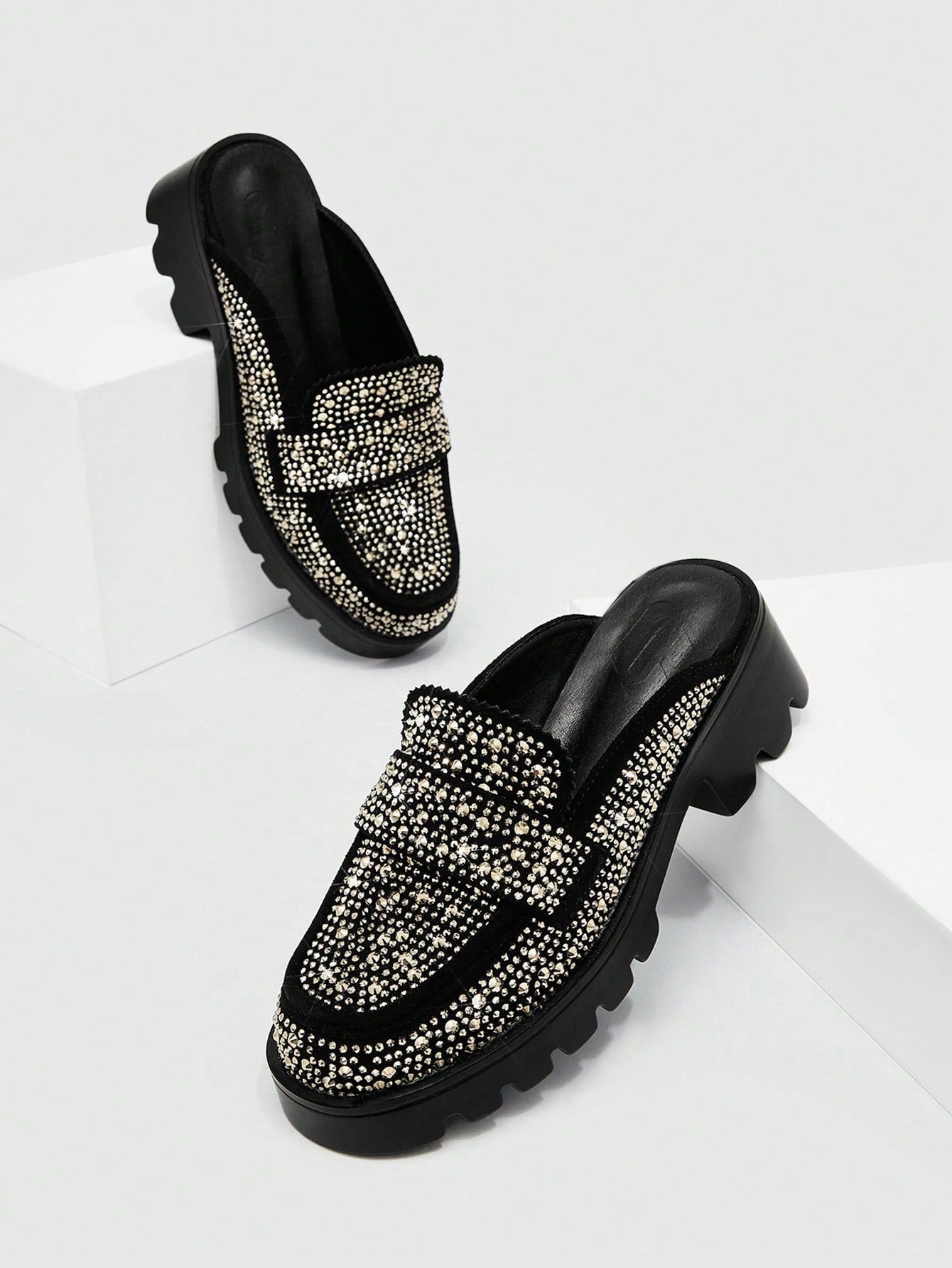 Step into sophistication with these stunning black wedge court shoes, where glamour meets everyday wearability. Adorned with eye-catching rhinestone details, they transform any outfit from ordinary to extraordinary. The comfortable wedge heel provides all-day support without sacrificing style, making them ideal for business casual settings, weekend getaways, or spring celebrations. Whether you're heading to the office or planning your next vacation, these versatile beauties deliver that perfect blend of ele