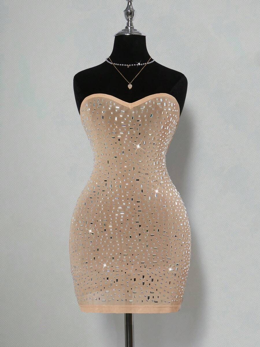 Turn heads at every rave and summer festival with this glamorous sheer bodycon dress, sparkling with rhinestone embellishments. Its figure-hugging design highlights your curves while the sheer fabric adds a daring, playful vibe. Perfect for dancing the night away in style and catching every eye in the crowd.