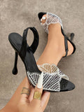 Black square open-toe slingback stiletto with pearl and rhinestone scalloped mesh vamp