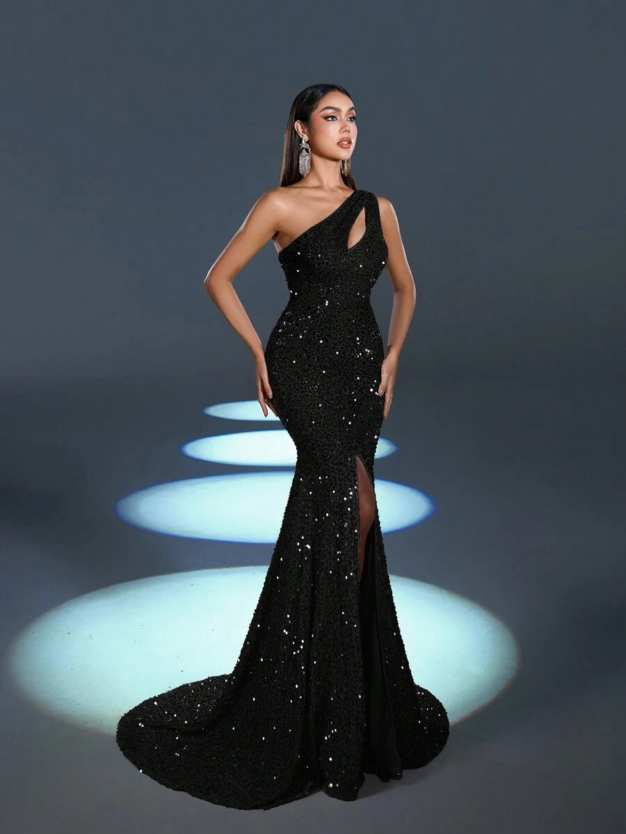 Turn heads at any formal event with this glamorous sequin one-shoulder dress. Featuring a dazzling mermaid hem that hugs your curves and a bold split for a touch of drama, this dress combines elegance with a playful edge. Sparkle confidently and dance through the night in style and comfort.