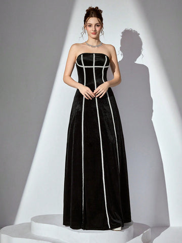 Slip into pure elegance with this show-stopping velvet cocktail dress that's ready to turn heads at any celebration. The luxurious strapless silhouette flatters every figure, while delicate faux pearl embellishments add a touch of sparkle and sophistication. Perfect for wedding receptions, prom nights, or any special occasion where you want to feel absolutely fabulous. The rich velvet fabric drapes beautifully and catches the light in all the right ways, ensuring you'll be the most glamorous guest in the ro