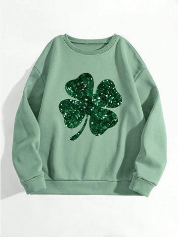 Add some sparkle and luck to your wardrobe with our Glittering Four-Leaf Clover Sweatshirt! Perfect for St. Patrick's Day celebrations or any cool weather day, this comfy hoodie will keep you cozy while also making a statement. Shine bright and stand out from the crowd with our stylish and playful sweatshirt.