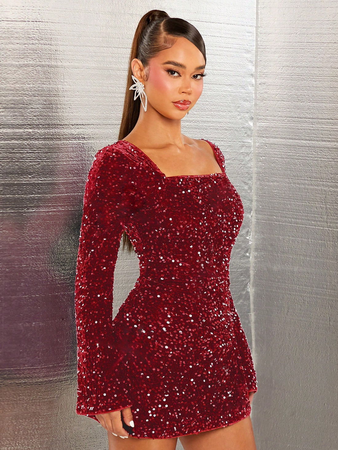 Add a touch of glamour to any occasion with our Glitzy Elegance dress! The sequin detailing, square neckline, and A-line silhouette create a stunning and elegant look. And with its sleek backless design, you'll be sure to turn heads and make a statement at any party.