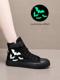 Enhance your Halloween and everyday look with these Glow-in-the-Dark Bat Print High Top Canvas Sneakers. Featuring a unique bat print design, these sneakers will make you stand out from the crowd. Made with high-quality canvas, they are comfortable and durable for all-day wear. Perfect for bat lovers and beyond!