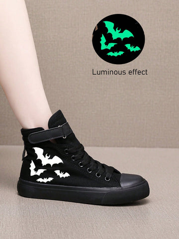 Enhance your Halloween and everyday look with these Glow-in-the-Dark Bat Print High Top Canvas Sneakers. Featuring a unique bat print design, these sneakers will make you stand out from the crowd. Made with high-quality canvas, they are comfortable and durable for all-day wear. Perfect for bat lovers and beyond!