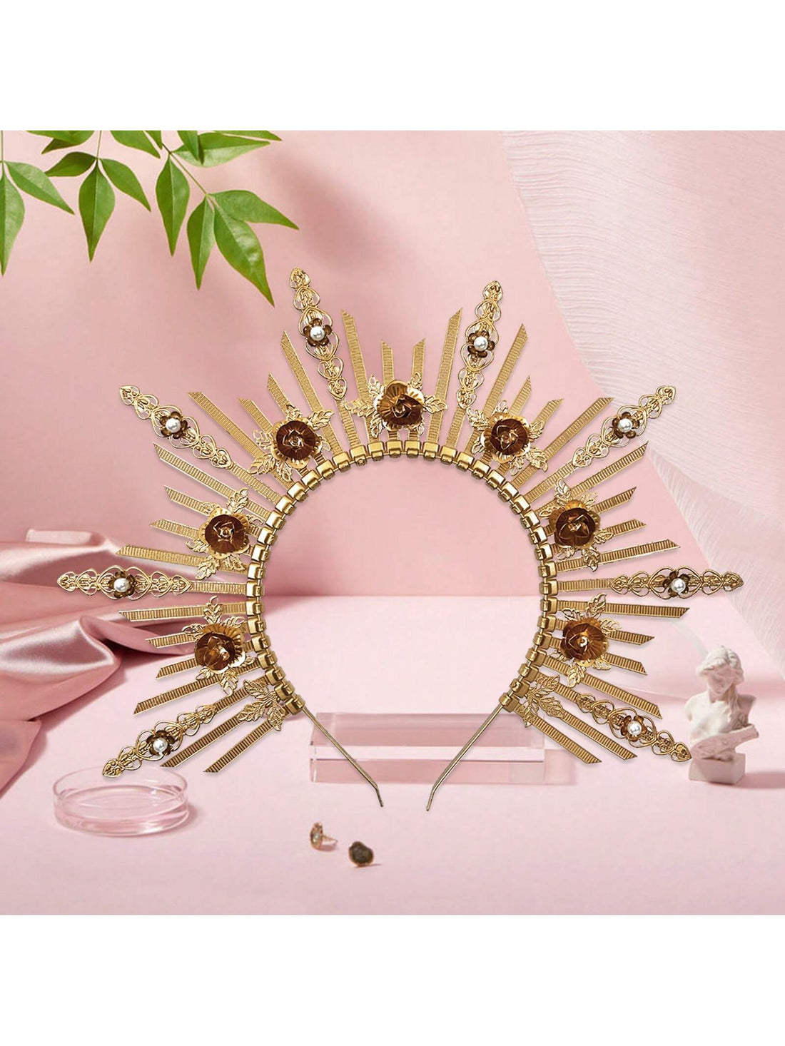 The Goddess Crown Headband is perfect for Halloween cosplay and costume parties. Made from high-quality metal, this enchanting headpiece will make you look like a true goddess. With intricate details and a comfortable fit, you'll steal the show at any event. Become a mystical being with this stunning accessory.