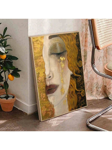 Add some elegance to your space with Gold Freya's Tears canvas art. Depicting the captivating eyes of a woman, this unframed decor invites a touch of mystery and allure. Perfect for any room, this high-quality print will add a unique and sophisticated touch. (Frame not included).