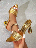 Step into the spotlight with these Gorgeous Gold Pyramid Decor High Heel Mules. Their sparkling gold finish and edgy pyramid accents add a daring twist to your party look, elevating your style with every step. Perfect for making a bold and glamorous statement, these mules combine fun and flair for unforgettable nights out.