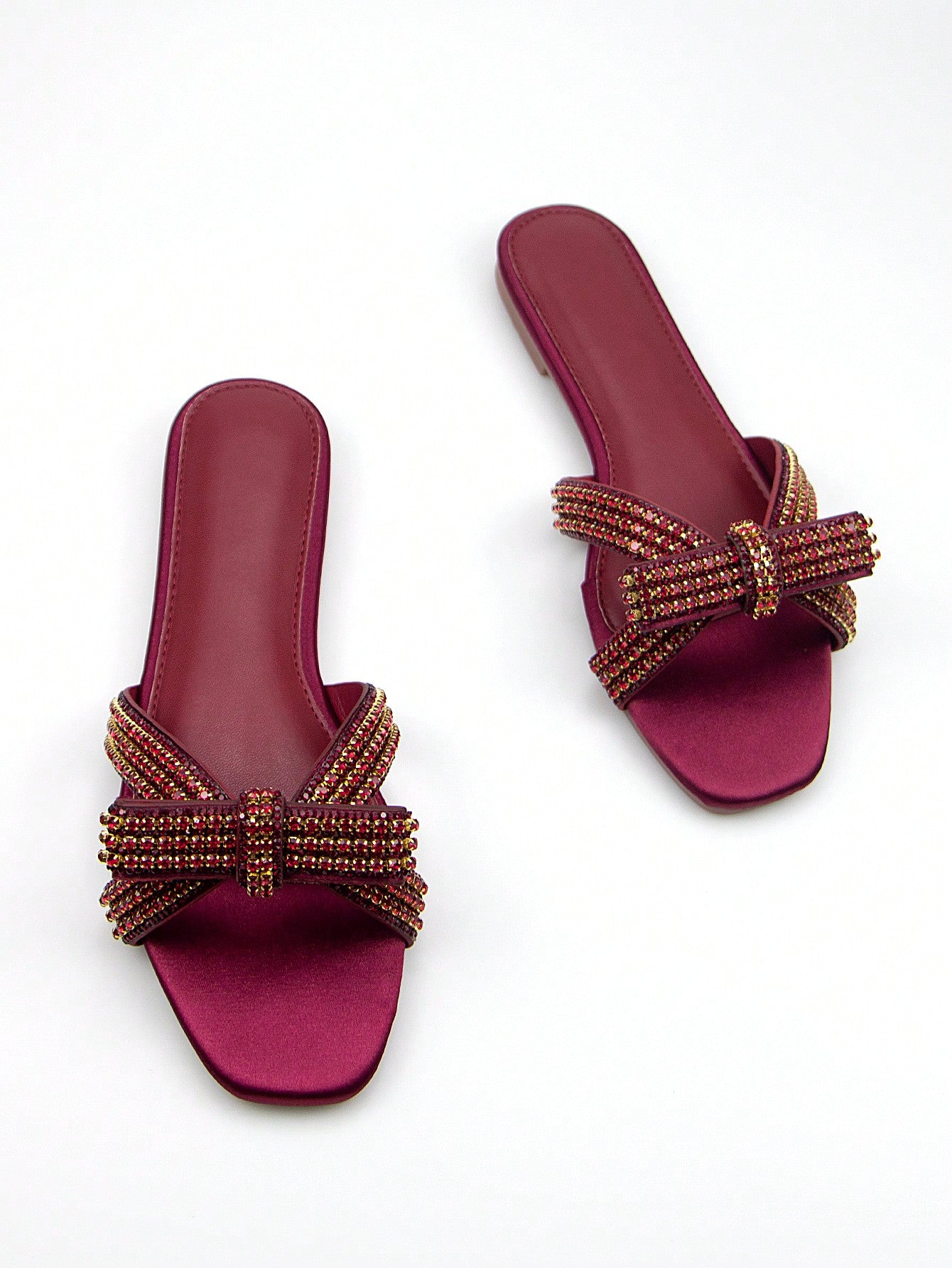 Step into sparkle with these eye-catching grey metallic flat sandals! The dazzling rhinestone chain bow adds just the right amount of bling to elevate your everyday look or make you shine at any party. Comfy enough for all-day adventures yet glam enough for evening escapades – these versatile beauties are ready to play whenever you are!