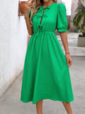 Experience sweet and stylish casual elegance with our Green Bow-Tied Puff Sleeve Dress. Its vibrant green color and unique bow-tied puff sleeves make a statement, while its comfortable and versatile design is perfect for any occasion. Upgrade your wardrobe and stand out in this must-have for women.