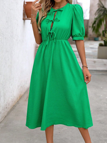 Experience sweet and stylish casual elegance with our Green Bow-Tied Puff Sleeve Dress. Its vibrant green color and unique bow-tied puff sleeves make a statement, while its comfortable and versatile design is perfect for any occasion. Upgrade your wardrobe and stand out in this must-have for women.