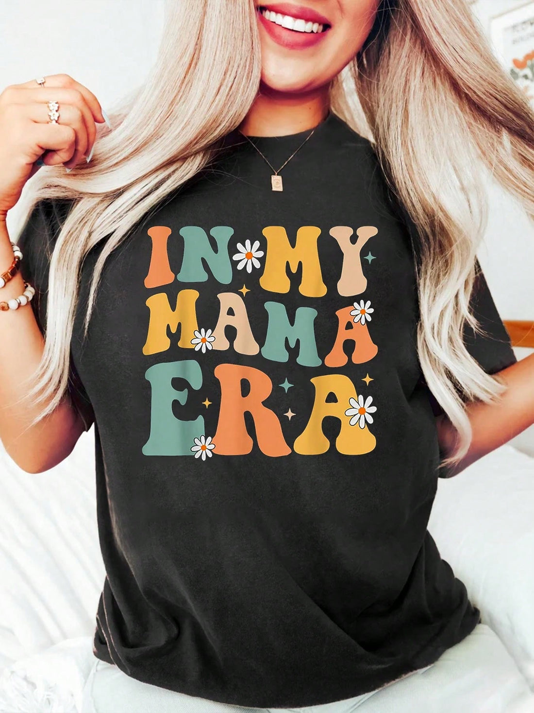 Get groovy with our Groovy Mama Era tee! Made from soft cotton, it's the perfect casual top for moms who don't take themselves too seriously. With playful graphics and a fun tone, this tee is sure to bring a smile to anyone's face. (Don't worry, it's also comfortable and stylish.) Bring out your inner cool mom with this versatile tee!