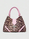 Front view of patterned grunge punk hobo shoulder bag with silver cross hardware