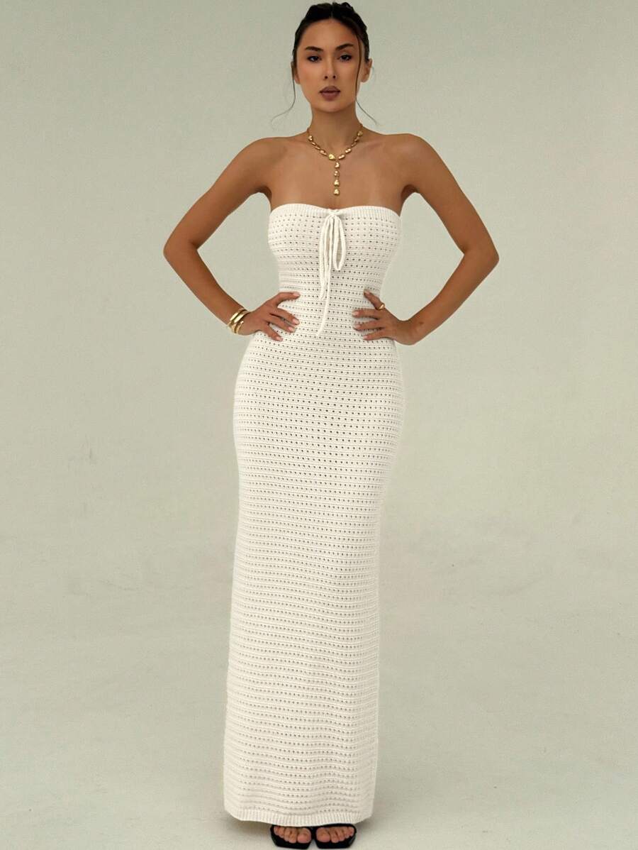 Elevate your summer wardrobe with this charming handmade crochet cami dress! Crafted with care, each piece features delicate openwork stitching that keeps you cool and breezy during warm weather. The adjustable cami straps offer a flattering fit, while the relaxed silhouette works beautifully for beach days, casual getaways, or laid-back brunches. Layer it over a slip dress or wear it solo for an effortlessly chic vibe. Whether you're packing for vacation or just want to feel fabulous in the sunshine, this 