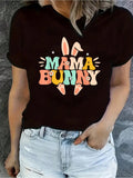 Celebrate Easter with a retro twist in our Happy Easter Mama Bunny Tee! With a groovy graphic and stylish design, this tee is perfect for cool moms looking to make a statement. Get ready to rock your Easter look with our Mama Bunny Tee!